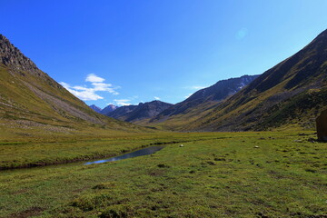 Second stage of Ak-Suu Traverse trek from Ailampa lake to Boz Uchuk lake, Karakol, Kyrgyzstan