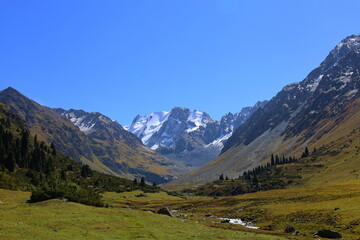 Naklejka premium Ninth stage of Ak-Suu Traverse trek from Karakol Gorge to Jeti Oguz in Karakol national park, Kyrgyzstan