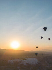 Amazing Aerial Footage of Hot Air Balloons in Pamukkale during the sunrise. High quality photo