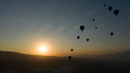 Amazing Aerial Footage of Hot Air Balloons in Pamukkale during the sunrise. High quality photo