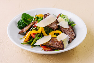 beef salad with basil, arugula and pepper