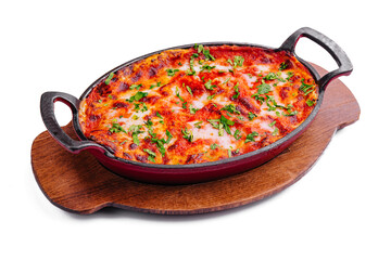 Cooked hot lasagna in a frying pan