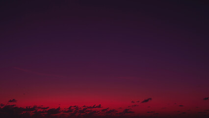 Red purple orange blue pink sunset sky cloud Red purple cloudscape background Dark red purple...