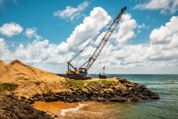Dragline excavator on the sea beach