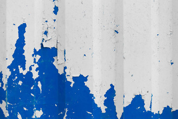Blue peeling old paint with metal surface fence texture background