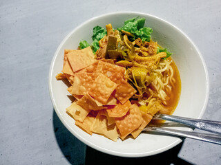 chicken noodle or mie ayam . popular street food in Indonesia