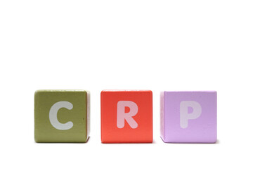 text CRP C Reactive Protein Test on colorful wooden isolated on a white