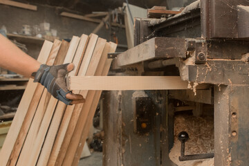 Fototapeta na wymiar Hand Male Worker Machine Tool Equipment Industrial Workshop Enterprise Wood Processing Wooden Planks