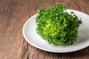 Frillice Iceberg Lettuce on white plate