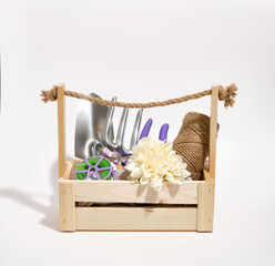 Wooden box with gardening tools for cultivation of salad and other vegatable or cultivating land.