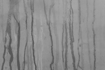 Grey streaks paint spilled surface ceramic tiles wall dirty old texture background, close-up, gray