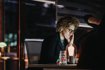 Collaborating Coworkers Discussing Business Growth and Analyzing Statistics for Project Deadline