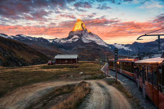 View of sunrise on Matterhorn mountain during the train ride up to Gornergrat at Zermatt, Switzerland