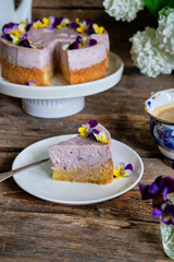 Blueberry cheesecake with violas