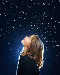 A little girl rests on top at christmas - childhood belief