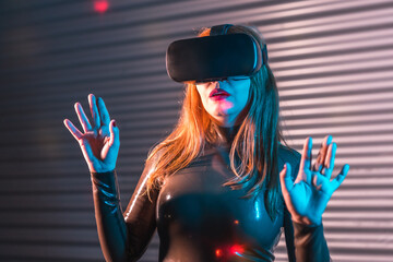 Surprised woman during an immersive game with Virtual reality goggles