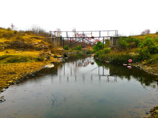 old iron bridge on river,india 2023 november 07