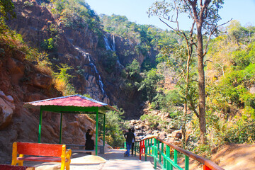 people enjoying at waterfall,india 2023 november 07