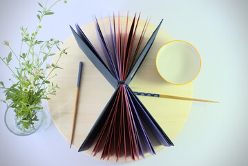 Handmade binding with color range leaves - Handmade binding with leaves in a range of colors