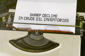 The text is printed on a typewriter - sharp decline in crude oil inventories