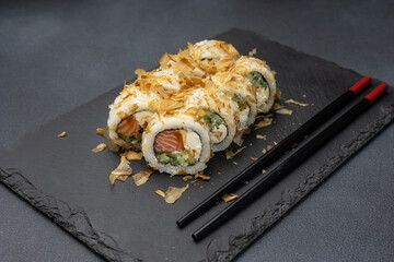 Japanese cuisine. Delicious rolls with salmon
