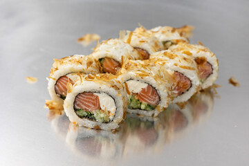 Japanese cuisine. Delicious rolls with salmon