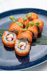 Japanese cuisine. Delicious rolls with salmon