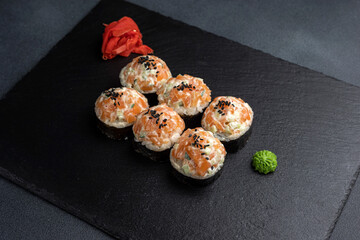 Japanese cuisine. Delicious rolls with salmon