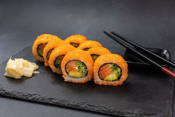 Japanese cuisine. Delicious rolls with salmon