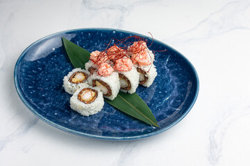 Japanese cuisine. Delicious Rolls with salmon and crab
