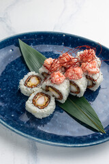 Japanese cuisine. Delicious Rolls with salmon and crab
