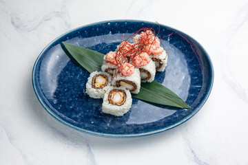 Japanese cuisine. Delicious Rolls with salmon and crab
