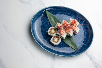 Japanese cuisine. Delicious Rolls with salmon and crab
