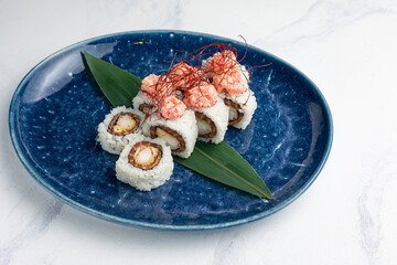 Japanese cuisine. Delicious Rolls with salmon and crab
