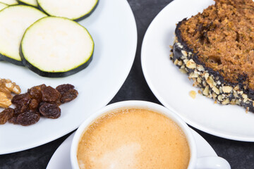 Fresh pastry made of zucchini and cup of white coffee. Delicious dessert