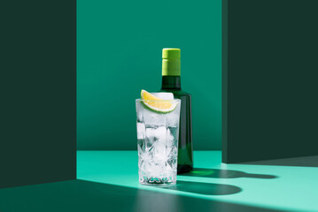 Artistic gin tonic cocktail setup with lime slice