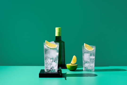 Elegant gin tonic setup with fresh lime slices