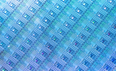 blue Silicon Wafer with microchips used in electronics for the fabrication of integrated circuits.