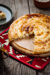 Traditional Bosnian and Turkish meal made from rolled pastry filled with spinach. In Turkey it is called Borek with cheese. In Bosnia this dish is called Pita Sirnica. Made from phyllo pastry.