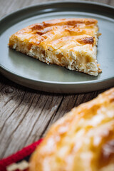Traditional Bosnian and Turkish meal made from rolled pastry filled with spinach. In Turkey it is called Borek with cheese. In Bosnia this dish is called Pita Sirnica. Made from phyllo pastry.