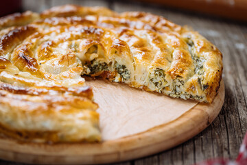 Traditional Bosnian and Turkish meal made from rolled pastry filled with spinach. In Turkey it is called Borek. In Bosnia this dish is called Pita Zeljanica. Made from phyllo 