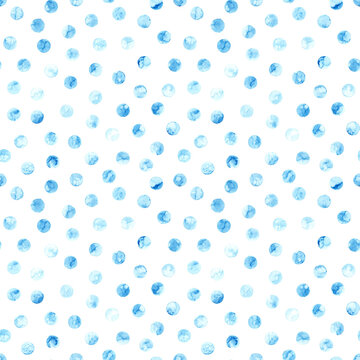 Watercolor seamless pattern in polka dot style. Grunge texture. Blue dots on a white background. Handwork with paints on paper. Print for your decor.
