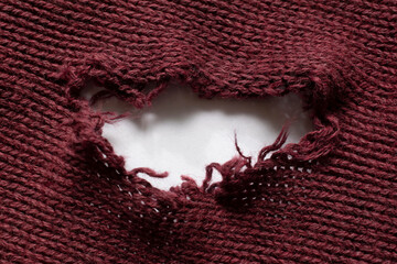 old wool sweater with holes