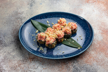 Japanese cuisine. Delicious fried rolls with salmon
