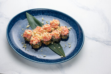 Japanese cuisine. Delicious fried rolls with salmon
