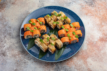 Japanese cuisine. Delicious fried rolls with salmon