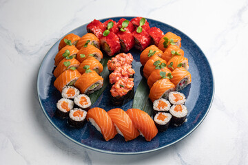 Japanese cuisine. Delicious fried rolls with salmon