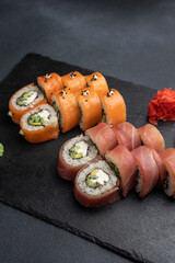 Japanese cuisine. Delicious fried rolls with salmon