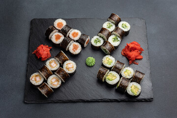 Japanese cuisine. Delicious fried rolls with salmon