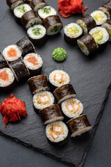 Japanese cuisine. Delicious fried rolls with salmon